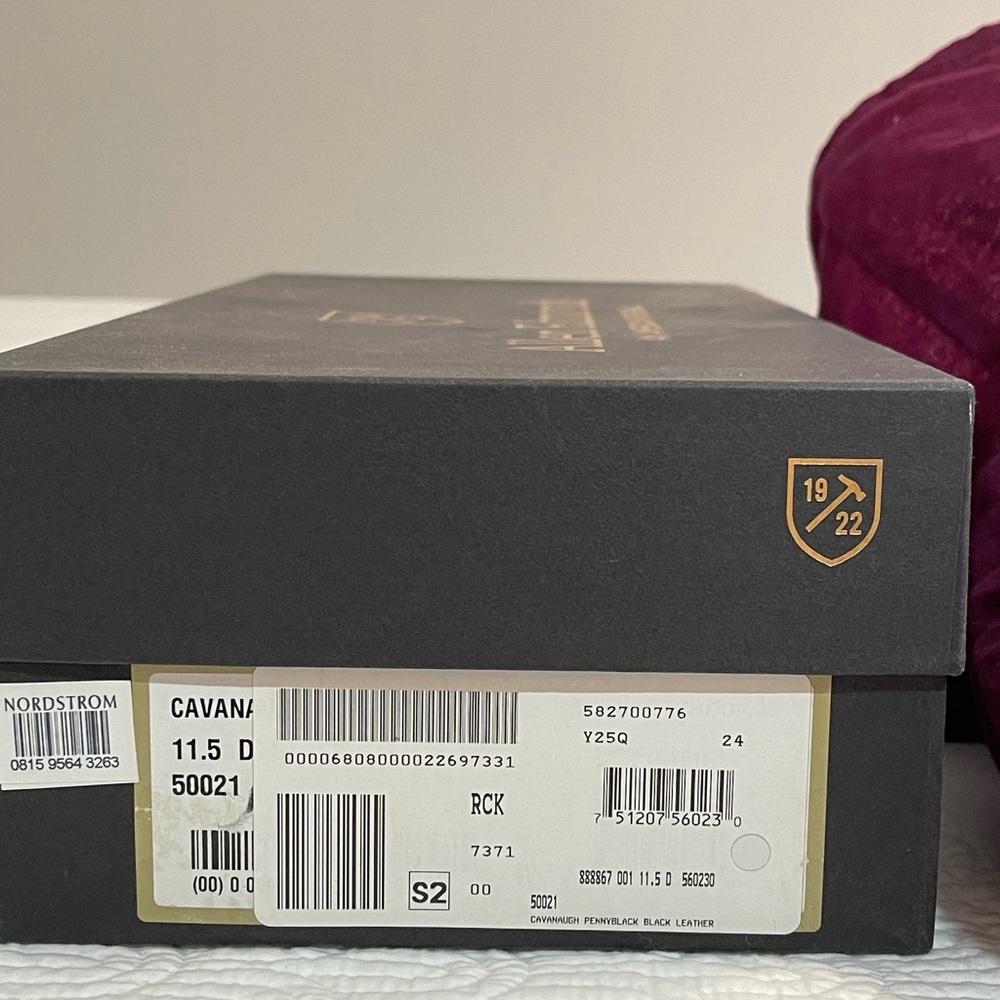Men shoes, loafer, news in box, and one duster bag.